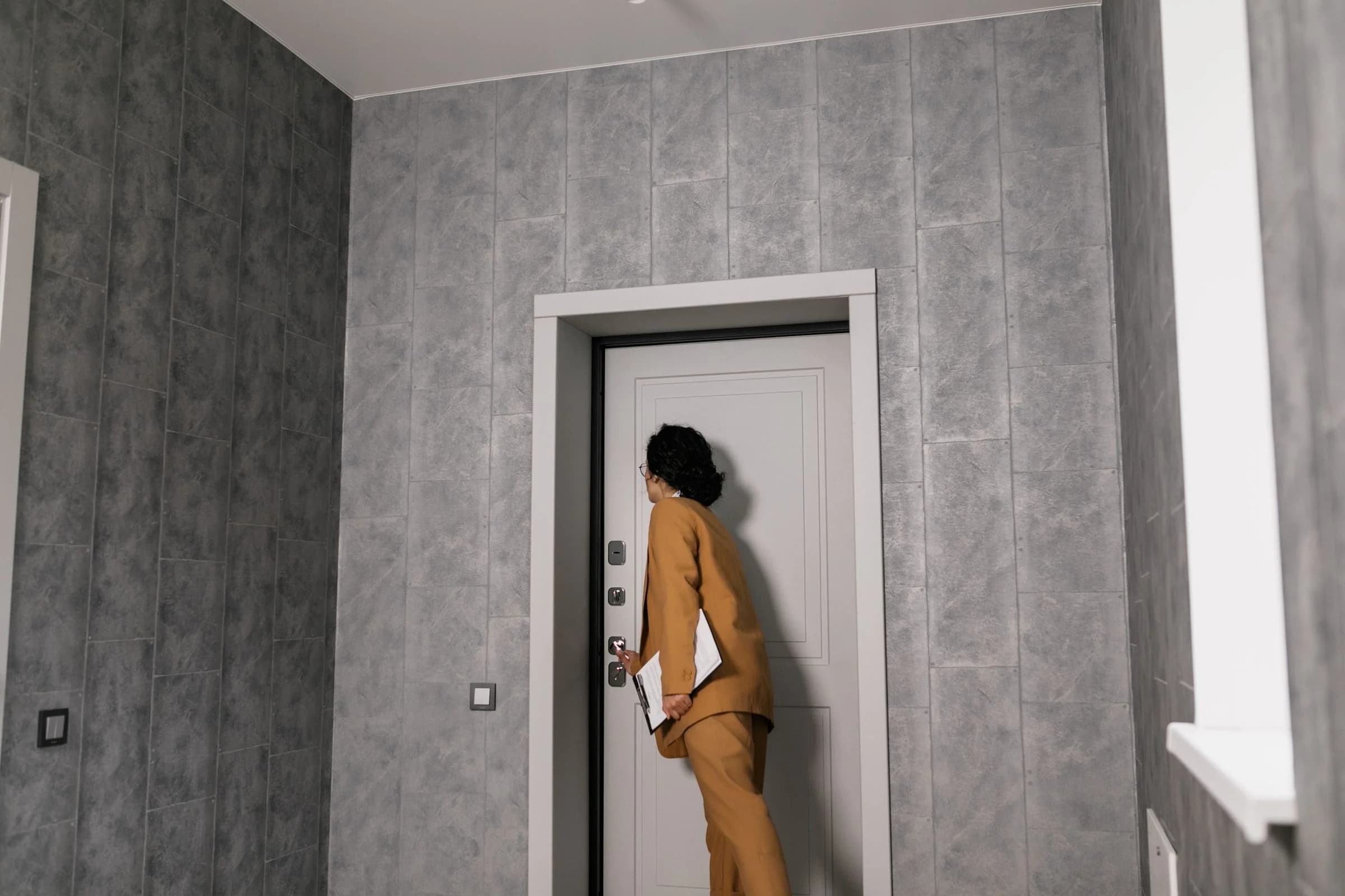 Property professional checking access to an apartment interior